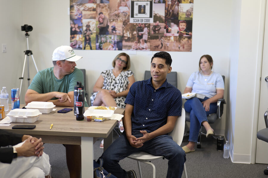 Small business owners seated at a live Secret Sauce session